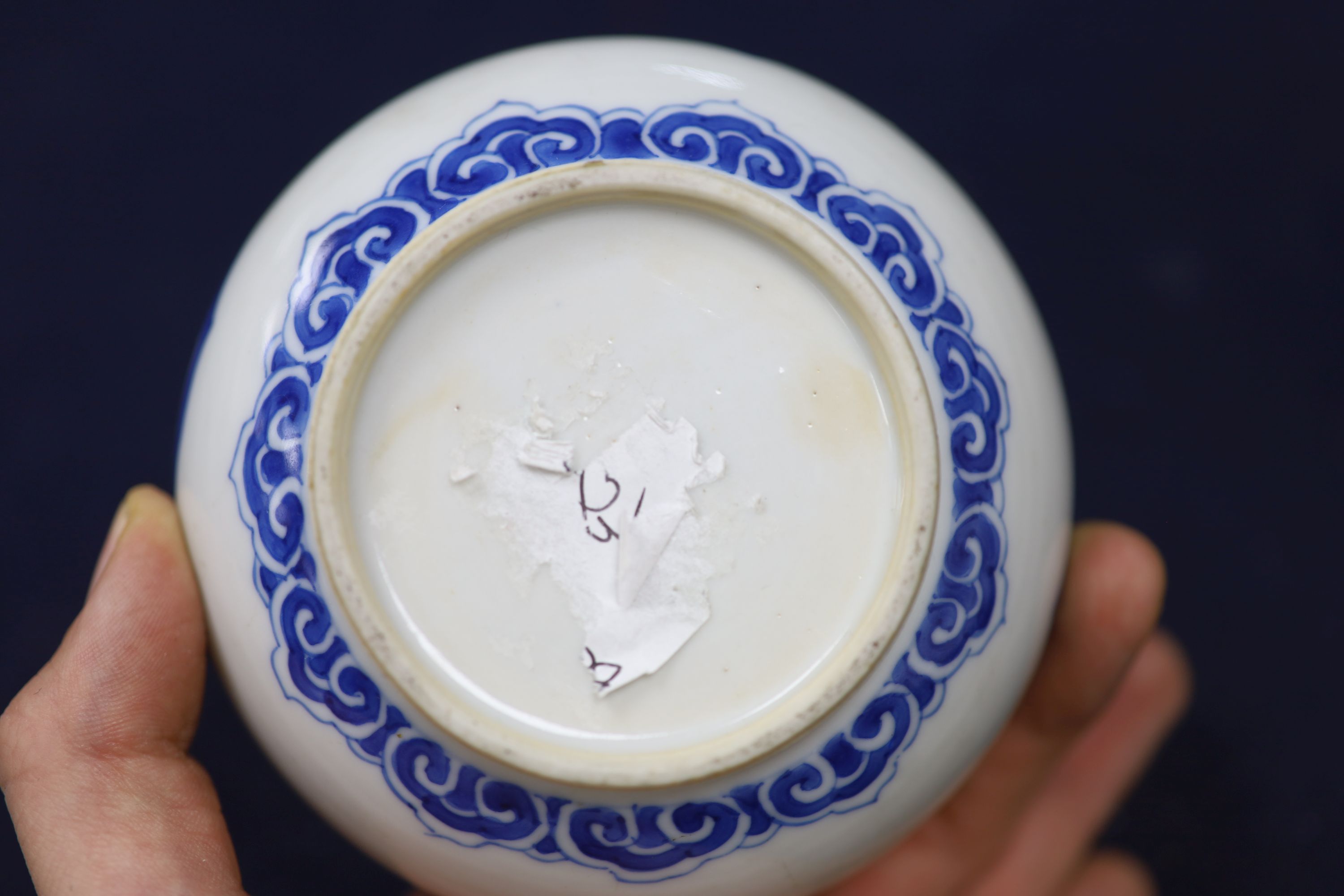 A pair of Chinese blue and white dishes and a similar jar and cover, tallest 12cm